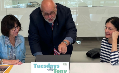 Tony Silio helping residents with permits